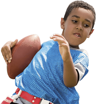 child playing football